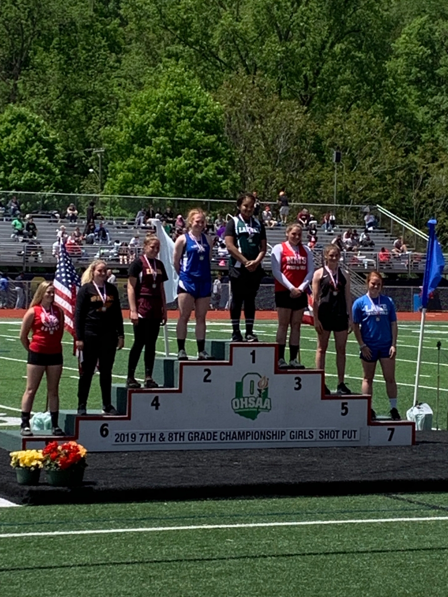 track podiums with people standing on it